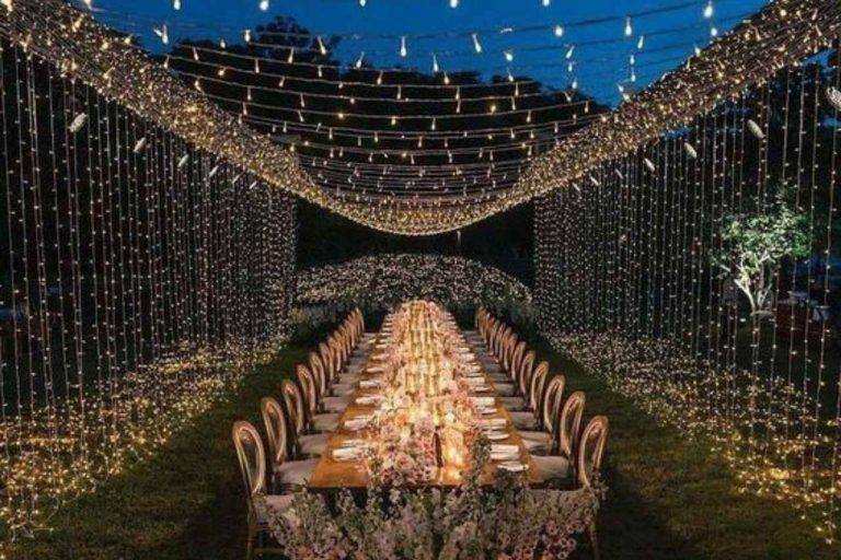 fairy light canopy twinkling above a wedding reception
