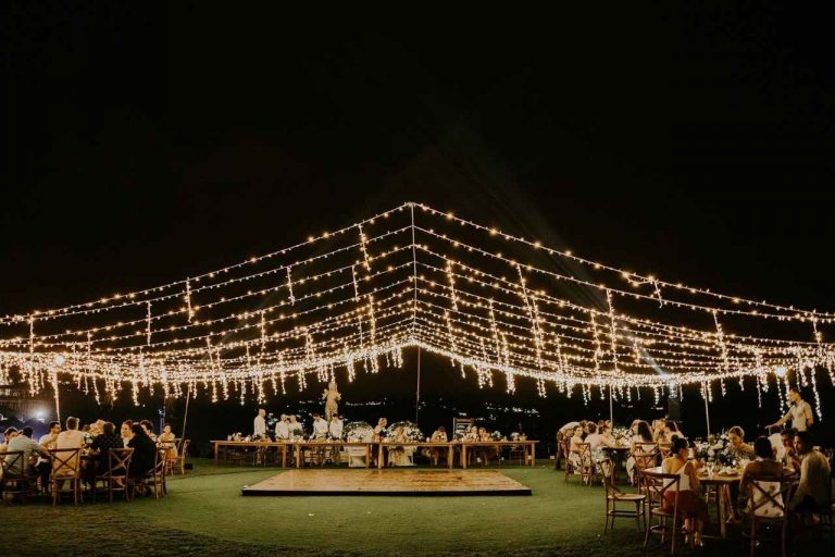 Fairy light roof shining bright above the wedding dance floor